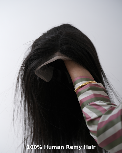 Luxurious Hair Haux 100% human remy hair extensions styled into soft waves, demonstrating their natural blend and shine