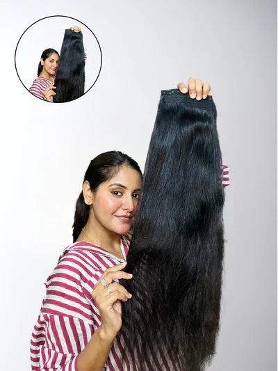 Indian woman with thin, long hair styled in a layered haircut, showcasing added volume and shine with 100% human Remy hair extensions