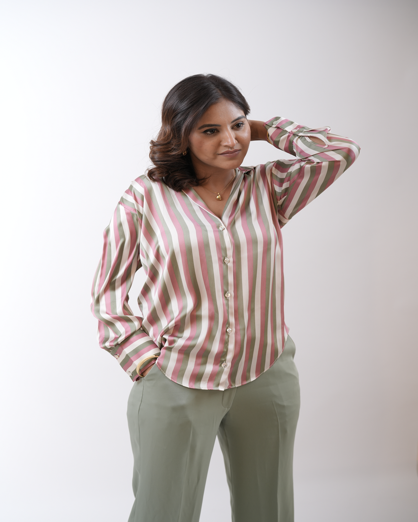 A confident woman showcasing a voluminous hairstyle for thin hair, styled with Hair Haux 100% human remy hair extensions, adding natural length and fullness