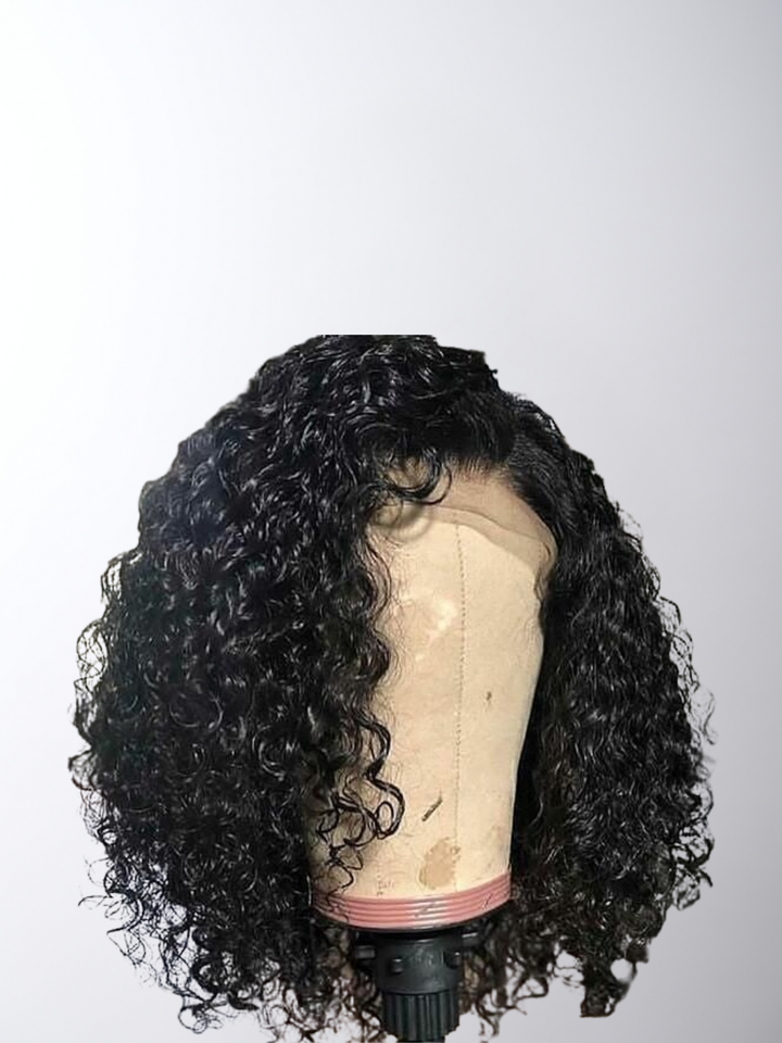 Elevate your style with our Full Lace Curly/Wavy Wig, made from 100% Human Remy Hair. Enjoy natural curls or waves with a flawless fit, luxurious texture, and endless styling versatility.